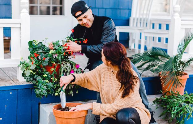 couple gardening on a porch in college hill, wichita kansas