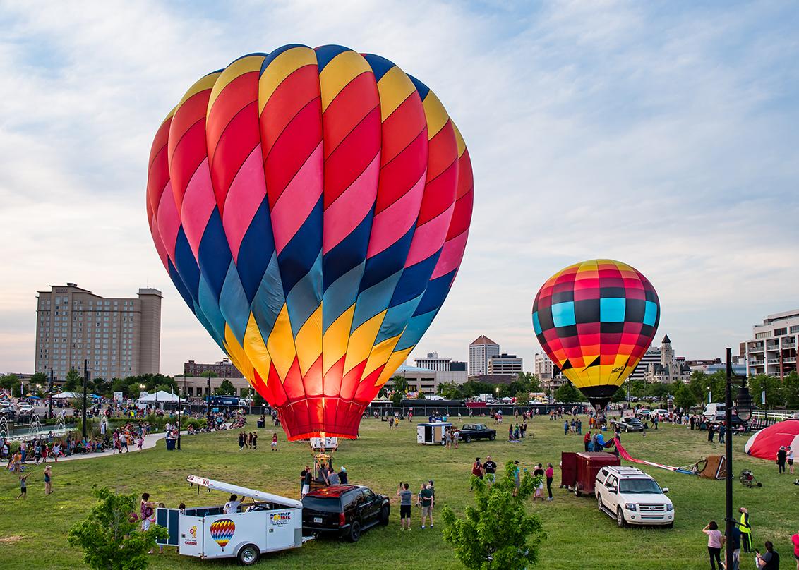 hot air balloons at riverfest in wichita kansas with skyline